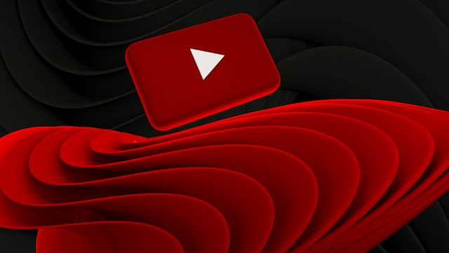 A red YouTube play button with abstract red and black waves in the background.