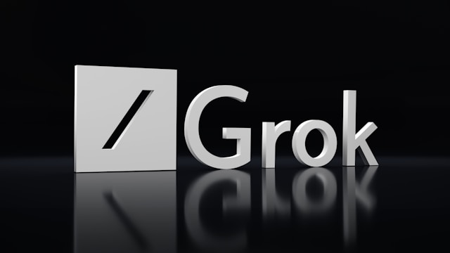 The Grok X AI logo in bold, metallic 3D letters, with a reflective surface below.