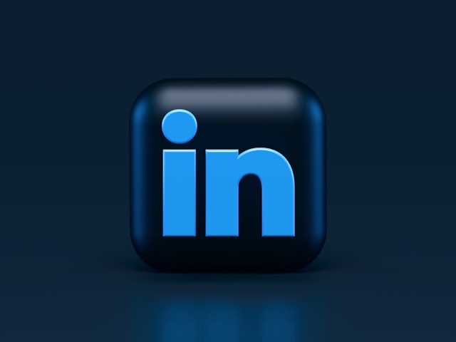 A sleek 3D LinkedIn logo on a dark background.